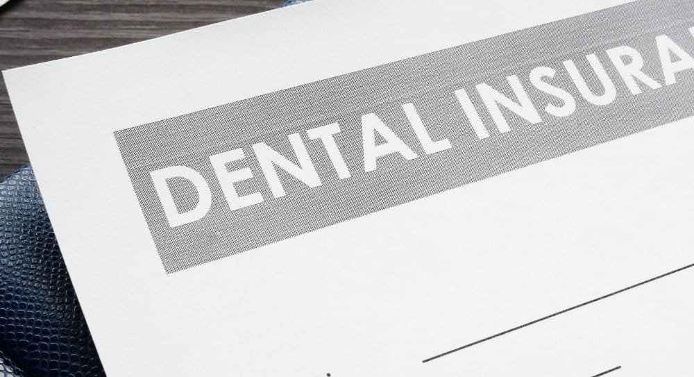 Photo of a dental insurance form on a desk.